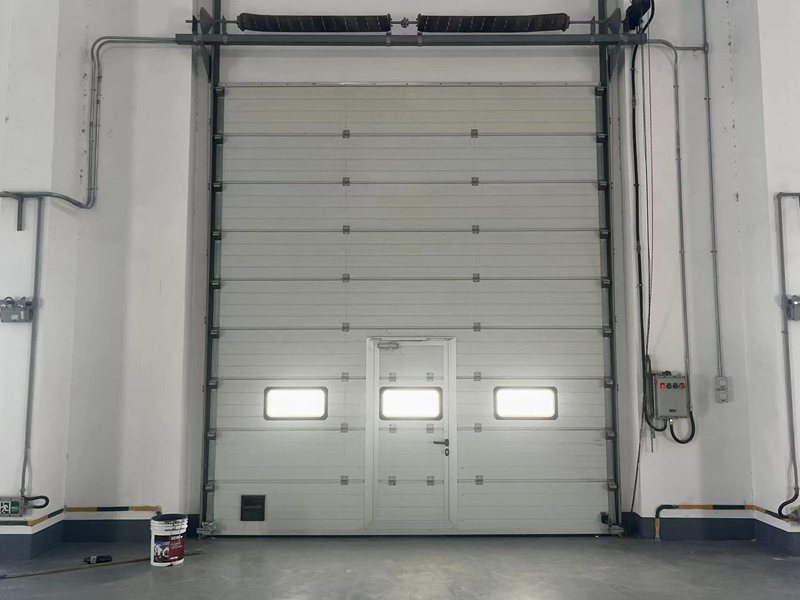 泰州汽车配件厂专用垂直转弯工业提升门插图1